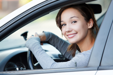 Pretty girl in a car